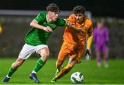 11 October 2023; Rory Finneran of Republic of Ireland in action against Gary Grigoryan of Armenia during the UEFA European U17 Championship qualifying group 10 match between Republic of Ireland and Armenia at Carrig Park in Fermoy, Cork. Photo by Eóin Noonan/Sportsfile