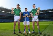 12 October 2023; Ireland players Peter Duggan, left, and David Fitzgerald with Scotland player Ruairidh Anderson in attendance at the Hurling Shinty International 2023 launch at Croke Park in Dublin. Photo by Piaras Ó Mídheach/Sportsfile