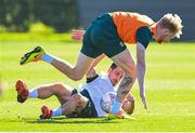 12 October 2023; Liam Scales and Jayson Molumby, bottom, during a Republic of Ireland training session at the FAI National Training Centre in Abbotstown, Dublin. Photo by Stephen McCarthy/Sportsfile