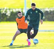 12 October 2023; Matt Doherty and Josh Cullen, left, during a Republic of Ireland training session at the FAI National Training Centre in Abbotstown, Dublin. Photo by Stephen McCarthy/Sportsfile