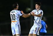 12 October 2023; James Clarke of Bohemians, right, celebrates with teammate Dylan Connolly after scoring their side's first goal during the SSE Airtricity Men's Premier Division match between UCD and Bohemians at UCD Bowl in Dublin. Photo by Ben McShane/Sportsfile