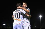 12 October 2023; Bartlomiej Kukulowicz, right, and Dylan Connolly of Bohemians, who assisted, celebrate their side's second goal, scored by teammate Danny Grant, not pictured, during the SSE Airtricity Men's Premier Division match between UCD and Bohemians at UCD Bowl in Dublin. Photo by Ben McShane/Sportsfile