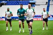 13 October 2023; Mack Hansen, second right, with teammates, from left, Jamison Gibson-Park, Conor Murray and Dave Kilcoyne during an Ireland Rugby captain's run at the Stade de France in Paris, France. Photo by Harry Murphy/Sportsfile