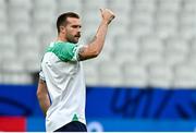 13 October 2023; Mack Hansen gives a thumbs up to the physios during an Ireland captain's run at Stade de France in Paris, France. Photo by Brendan Moran/Sportsfile