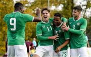 13 October 2023; Armstrong Okoflex of Republic of Ireland, centre, celebrates with team-mates Tony Springett, left, and James Furlong, right, after scoring his side's second goal during the UEFA European U21 Championship qualifying group A match between Latvia and Republic of Ireland at the Zemgales Olympic Centre in Jelgava, Latvia. Photo by Roman Koksarov/Sportsfile