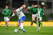 13 October 2023; Kostas Tsimikas of Greece in action against Alan Browne of Republic of Ireland during the UEFA EURO 2024 Championship qualifying group B match between Republic of Ireland and Greece at the Aviva Stadium in Dublin. Photo by Stephen McCarthy/Sportsfile