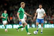13 October 2023; Liam Scales of Republic of Ireland in action against Giorgos Masouras of Greece during the UEFA EURO 2024 Championship qualifying group B match between Republic of Ireland and Greece at the Aviva Stadium in Dublin. Photo by Michael P Ryan/Sportsfile