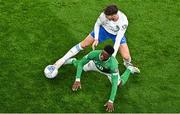 13 October 2023; Petros Mantalos of Greece is tackled by Chiedozie Ogbene of Republic of Ireland during the UEFA EURO 2024 Championship qualifying group B match between Republic of Ireland and Greece at the Aviva Stadium in Dublin. Photo by Sam Barnes/Sportsfile