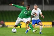 13 October 2023; Chiedozie Ogbene of Republic of Ireland in action against Kostas Tsimikas of Greece during the UEFA EURO 2024 Championship qualifying group B match between Republic of Ireland and Greece at the Aviva Stadium in Dublin. Photo by Stephen McCarthy/Sportsfile