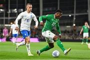 13 October 2023; Chiedozie Ogbene of Republic of Ireland in action against Dimitris Pelkas of Greece during the UEFA EURO 2024 Championship qualifying group B match between Republic of Ireland and Greece at the Aviva Stadium in Dublin. Photo by Stephen McCarthy/Sportsfile