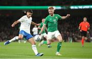 13 October 2023; Giorgos Masouras of Greece in action against Liam Scales of Republic of Ireland during the UEFA EURO 2024 Championship qualifying group B match between Republic of Ireland and Greece at the Aviva Stadium in Dublin. Photo by Michael P Ryan/Sportsfile