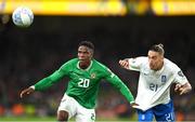 13 October 2023; Chiedozie Ogbene of Republic of Ireland in action against Kostas Tsimikas of Greece during the UEFA EURO 2024 Championship qualifying group B match between Republic of Ireland and Greece at the Aviva Stadium in Dublin. Photo by Seb Daly/Sportsfile
