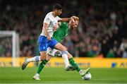 13 October 2023; Liam Scales of Republic of Ireland in action against Andreas Bouchalakis of Greece during the UEFA EURO 2024 Championship qualifying group B match between Republic of Ireland and Greece at the Aviva Stadium in Dublin. Photo by Stephen McCarthy/Sportsfile