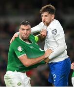 13 October 2023; Shane Duffy of Republic of Ireland and Panagiotis Retsos of Greece during the UEFA EURO 2024 Championship qualifying group B match between Republic of Ireland and Greece at the Aviva Stadium in Dublin. Photo by Seb Daly/Sportsfile