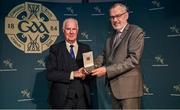13 October 2023; Liam Ó Donnchú is presented with the 2021 MacNamee Best GAA Publication Award by Uachtarán Chumann Lúthchleas Gael Larry McCarthy during the GAA MacNamee Awards 2021 & 2022 at Cusack Suite in Croke Park, Dublin. Photo by David Fitzgerald/Sportsfile *** NO REPRODUCTION FEE ***
