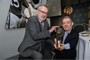 13 October 2023; Enda McEvoy of Kilkenny is presented with the 2021 MacNamee Hall of Fame Award by Uachtarán Chumann Lúthchleas Gael Larry McCarthy during the GAA MacNamee Awards 2021 & 2022 at Cusack Suite in Croke Park, Dublin. Photo by David Fitzgerald/Sportsfile