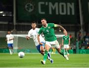 13 October 2023; Shane Duffy of Republic of Ireland in action against Giorgos Masouras of Greece during the UEFA EURO 2024 Championship qualifying group B match between Republic of Ireland and Greece at the Aviva Stadium in Dublin. Photo by Michael P Ryan/Sportsfile