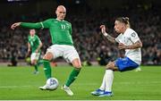 13 October 2023; Will Smallbone of Republic of Ireland in action against Kostas Tsimikas of Greece during the UEFA EURO 2024 Championship qualifying group B match between Republic of Ireland and Greece at the Aviva Stadium in Dublin. Photo by Seb Daly/Sportsfile