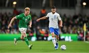 13 October 2023; Giorgos Masouras of Greece in action against Liam Scales of Republic of Ireland during the UEFA EURO 2024 Championship qualifying group B match between Republic of Ireland and Greece at the Aviva Stadium in Dublin. Photo by Seb Daly/Sportsfile