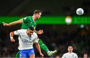 13 October 2023; Shane Duffy of Republic of Ireland in action against Giorgos Giakoumakis of Greece during the UEFA EURO 2024 Championship qualifying group B match between Republic of Ireland and Greece at the Aviva Stadium in Dublin. Photo by Tyler Miller/Sportsfile