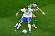 13 October 2023; Kostas Tsimikas of Greece in action against Alan Browne of Republic of Ireland during the UEFA EURO 2024 Championship qualifying group B match between Republic of Ireland and Greece at the Aviva Stadium in Dublin. Photo by Sam Barnes/Sportsfile