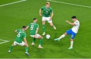 13 October 2023; Republic of Ireland players, from left, Josh Cullen, Alan Browne and Liam Scales look on as Petros Mantalos of Greece has a shot on goal during the UEFA EURO 2024 Championship qualifying group B match between Republic of Ireland and Greece at the Aviva Stadium in Dublin. Photo by Sam Barnes/Sportsfile