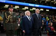 13 October 2023; President of Ireland Michael D Higgins accompanied by FAI President Gerry McAnaney, right, before the UEFA EURO 2024 Championship qualifying group B match between Republic of Ireland and Greece at the Aviva Stadium in Dublin. Photo by Stephen McCarthy/Sportsfile