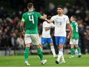 13 October 2023; Shane Duffy of Republic of Ireland shakes hand with Andreas Bouchalakis of Greece after the UEFA EURO 2024 Championship qualifying group B match between Republic of Ireland and Greece at the Aviva Stadium in Dublin. Photo by Michael P Ryan/Sportsfile