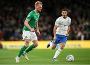 13 October 2023; Liam Scales of Republic of Ireland in action against Giorgos Masouras of Greece during the UEFA EURO 2024 Championship qualifying group B match between Republic of Ireland and Greece at the Aviva Stadium in Dublin. Photo by Michael P Ryan/Sportsfile