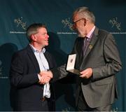 13 October 2023; Malachy Clerkin, The Irish Times, is presented the with the 2021 National Media Award by Uachtarán Chumann Lúthchleas Gael Larry McCarthy during the GAA MacNamee Awards 2021 & 2022 at Cusack Suite in Croke Park, Dublin. Photo by Ray McManus/Sportsfile