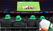14 October 2023; Ireland supporters watch the 2023 Rugby World Cup quarter-final match between Wales and Argentina on the big screen before the 2023 Rugby World Cup quarter-final match between Ireland and New Zealand at the Stade de France in Paris, France. Photo by Harry Murphy/Sportsfile