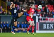 14 October 2023; Shauna Brennan of Athlone Town in action against Keri Loughrey of Sligo Rovers during the FAI Women's Cup semi-final match between Sligo Rovers and Athlone Town at The Showgrounds in Sligo. Photo by Tyler Miller/Sportsfile