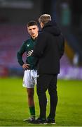14 October 2023; Matthew Moore of Republic of Ireland with Republic of Ireland head coach Colin O'Brien before the UEFA European U17 Championship qualifying round 10 match between Republic of Ireland and Iceland at Turner's Cross in Cork. Photo by Eóin Noonan/Sportsfile