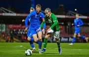 14 October 2023; Kyle Fitzgerald of Republic of Ireland in action against Solvi Stefansson of Iceland during the UEFA European U17 Championship qualifying round 10 match between Republic of Ireland and Iceland at Turner's Cross in Cork. Photo by Eóin Noonan/Sportsfile
