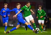 14 October 2023; Niall McAndrews of Republic of Ireland in action against Gabriel Snar Hallsson of Iceland during the UEFA European U17 Championship qualifying round 10 match between Republic of Ireland and Iceland at Turner's Cross in Cork. Photo by Eóin Noonan/Sportsfile