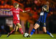 14 October 2023; Jodie Loughrey of Sligo Rovers in action against Laurie Ryan of Athlone Town during the FAI Women's Cup semi-final match between Sligo Rovers and Athlone Town at The Showgrounds in Sligo. Photo by Tyler Miller/Sportsfile