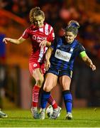 14 October 2023; Jodie Loughrey of Sligo Rovers in action against Laurie Ryan of Athlone Town during the FAI Women's Cup semi-final match between Sligo Rovers and Athlone Town at The Showgrounds in Sligo. Photo by Tyler Miller/Sportsfile