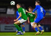 14 October 2023; Niall McAndrews of Republic of Ireland in action against Robert Elis Hlynsson of Iceland during the UEFA European U17 Championship qualifying round 10 match between Republic of Ireland and Iceland at Turner's Cross in Cork. Photo by Eóin Noonan/Sportsfile