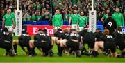 14 October 2023; Ireland players, including Jonathan Sexton, centre, watch New Zealand players perform the Haka before the 2023 Rugby World Cup quarter-final match between Ireland and New Zealand at the Stade de France in Paris, France. Photo by Brendan Moran/Sportsfile