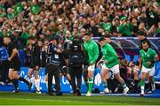 14 October 2023; Jonathan Sexton of Ireland collides with a roving camera operator as he leads his team out before the 2023 Rugby World Cup quarter-final match between Ireland and New Zealand at the Stade de France in Paris, France. Photo by Harry Murphy/Sportsfile