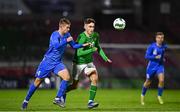 14 October 2023; Mason Melia of Republic of Ireland in action against Jón Arnar Sigurösson of Iceland during the UEFA European U17 Championship qualifying round 10 match between Republic of Ireland and Iceland at Turner's Cross in Cork. Photo by Eóin Noonan/Sportsfile