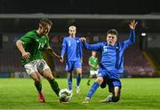 14 October 2023; Kaylem Harnett of Republic of Ireland in action against Mikael Breki bordarson of Iceland during the UEFA European U17 Championship qualifying round 10 match between Republic of Ireland and Iceland at Turner's Cross in Cork. Photo by Eóin Noonan/Sportsfile