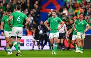14 October 2023; Jonathan Sexton of Ireland, centre, and teammates react after their side conceded a first try, in the 20th minute, during the 2023 Rugby World Cup quarter-final match between Ireland and New Zealand at the Stade de France in Paris, France. Photo by Ramsey Cardy/Sportsfile