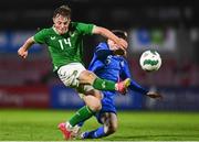 14 October 2023; Kaylem Harnett of Republic of Ireland in action against Mikael Breki bordarson of Iceland during the UEFA European U17 Championship qualifying round 10 match between Republic of Ireland and Iceland at Turner's Cross in Cork. Photo by Eóin Noonan/Sportsfile