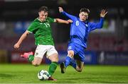 14 October 2023; Kaylem Harnett of Republic of Ireland in action against Mikael Breki Bordarson of Iceland during the UEFA European U17 Championship qualifying round 10 match between Republic of Ireland and Iceland at Turner's Cross in Cork. Photo by Eóin Noonan/Sportsfile