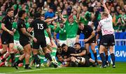 14 October 2023; Jamison Gibson-Park of Ireland, bottom, scores his side's second try, in the 39th minute, as teammate Josh van der Flier, behind celebrates, during the 2023 Rugby World Cup quarter-final match between Ireland and New Zealand at the Stade de France in Paris, France. Photo by Harry Murphy/Sportsfile