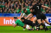 14 October 2023; Hugo Keenan of Ireland is tackled by Ardie Savea of New Zealand during the 2023 Rugby World Cup quarter-final match between Ireland and New Zealand at the Stade de France in Paris, France. Photo by Brendan Moran/Sportsfile