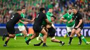 14 October 2023; Jimmy O’Brien of Ireland is tackled by Leicester Fainga'anuku, 11, and Ardie Savea of New Zealand during the 2023 Rugby World Cup quarter-final match between Ireland and New Zealand at the Stade de France in Paris, France. Photo by Ramsey Cardy/Sportsfile