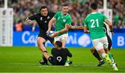 14 October 2023; Jonathan Sexton of Ireland is tackled by Aaron Smith of New Zealand during the 2023 Rugby World Cup quarter-final match between Ireland and New Zealand at the Stade de France in Paris, France. Photo by Brendan Moran/Sportsfile
