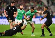14 October 2023; Jimmy O’Brien of Ireland is tackled by Richie Mo'unga, left, and Aaron Smith of New Zealand during the 2023 Rugby World Cup quarter-final match between Ireland and New Zealand at the Stade de France in Paris, France. Photo by Ramsey Cardy/Sportsfile